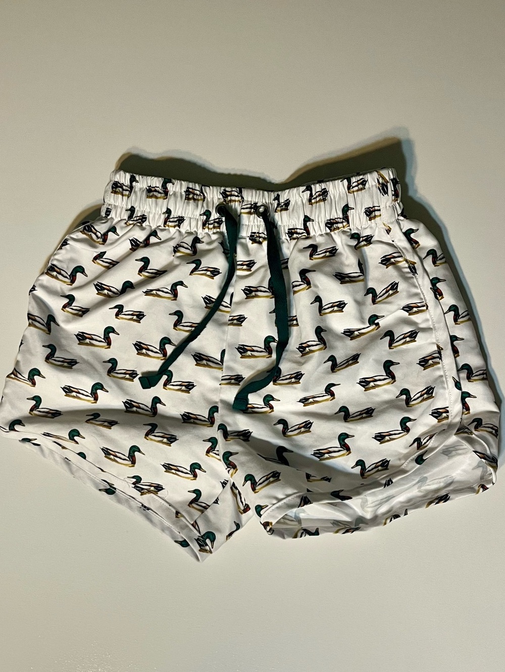 Buck Brothers | White Duck-Print Swim Trunks Green Drawstring